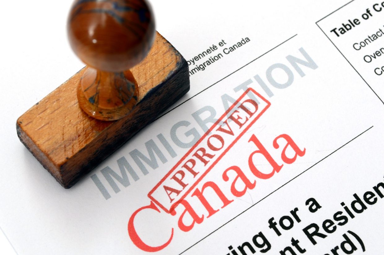 Approved stamp on Canadian immigration form