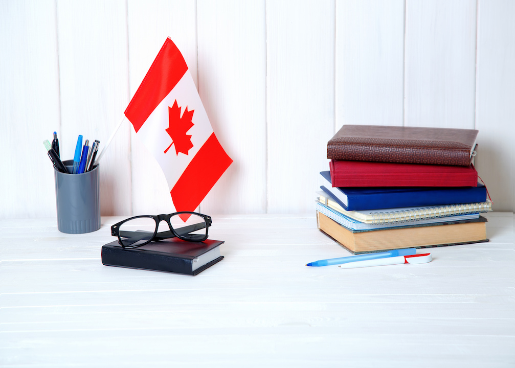 Items on desk with Canada flag