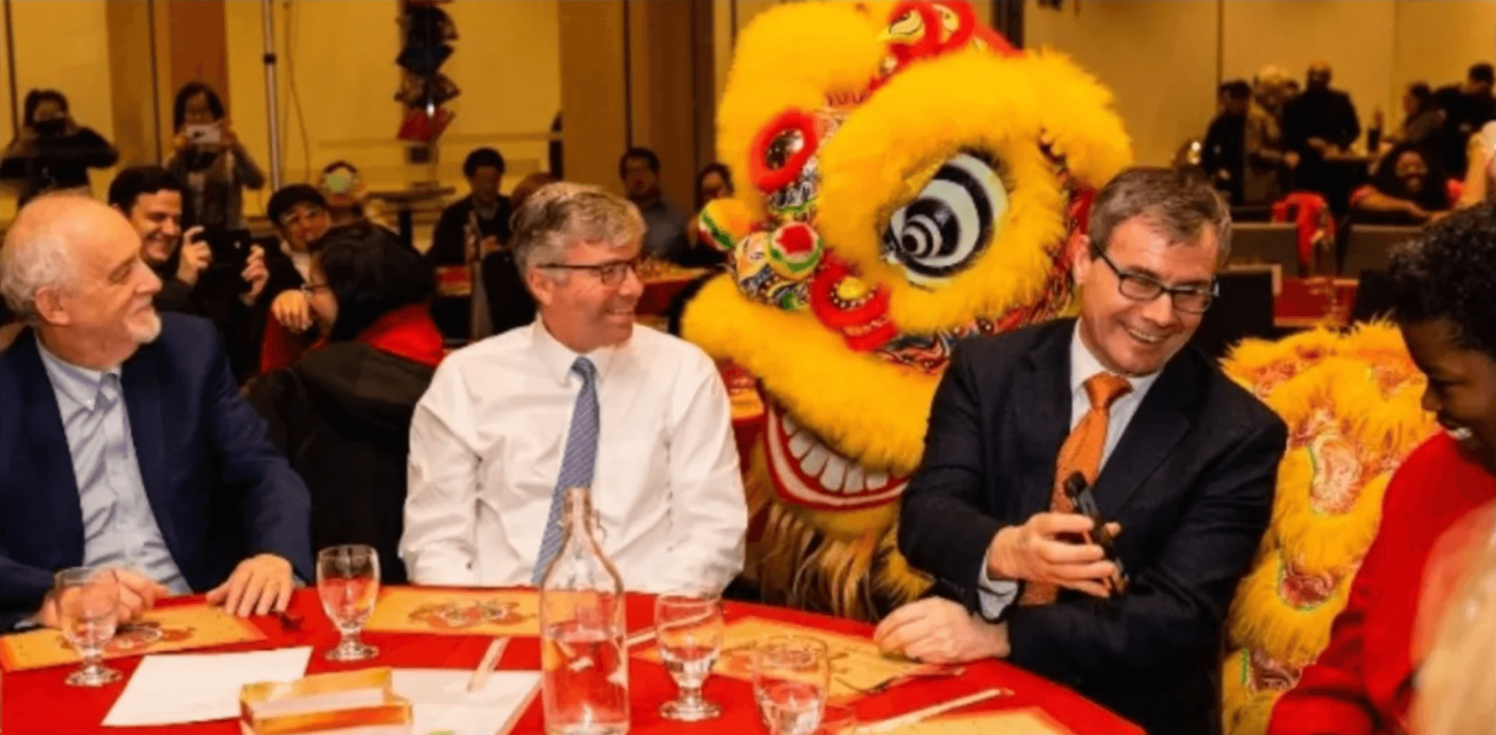 Event attendees entertained by Chinese lion
