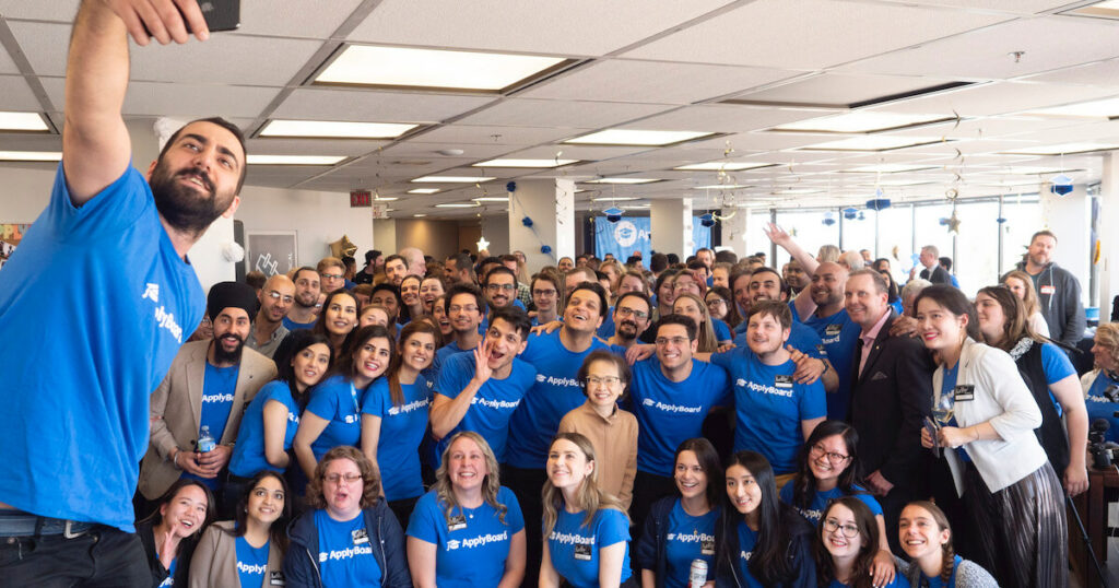 ApplyBoard staff take a selfie during the office's grand opening