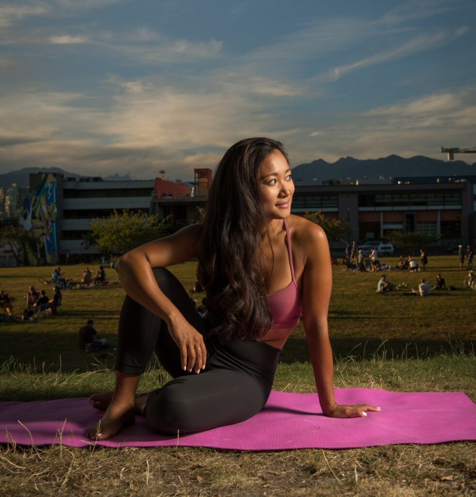 Diana Change doing yoga