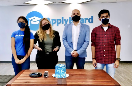 ApplyBoard staff, in office, wearing masks