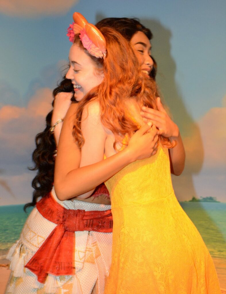 ApplyBoard team member hugging Moana at Walt Disney World