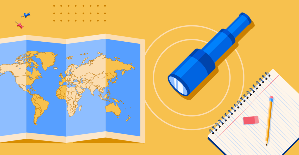 A map of the world, a telescope, and some school supplies