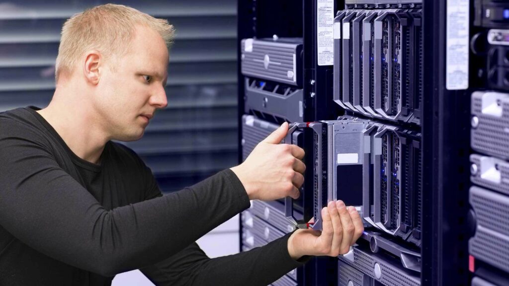 Photo of Yorkville University student working on computer servers