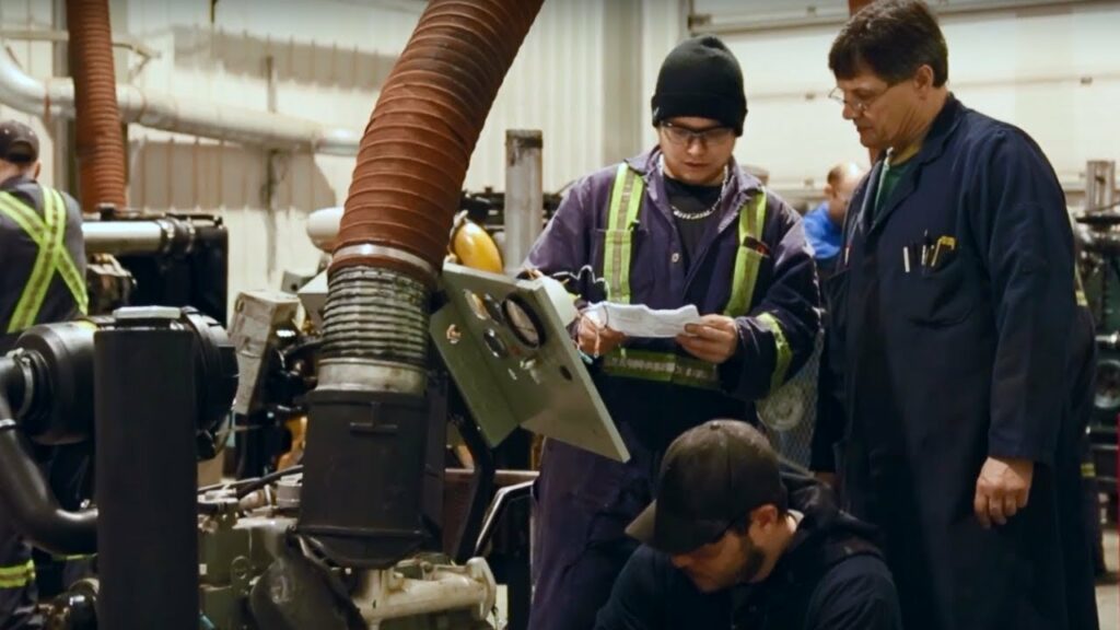 Photography of Heavy Equipment and Truck Transport Technician student and skilled trades programs instructor.