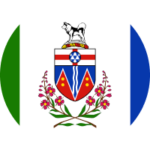 A partial flag of the Yukon: a husky atop a red, blue, and white crest, which is framed on the bottom and both sides with a tall red compound flower. The crest is on a white field, with a green bar to the left and a blue bar to the right.