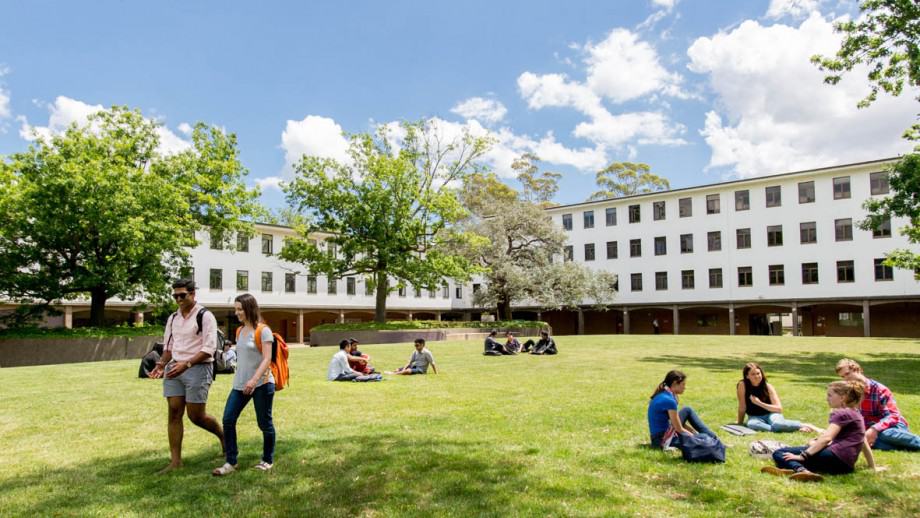 A photo of students walking around the Australian National University's campus.