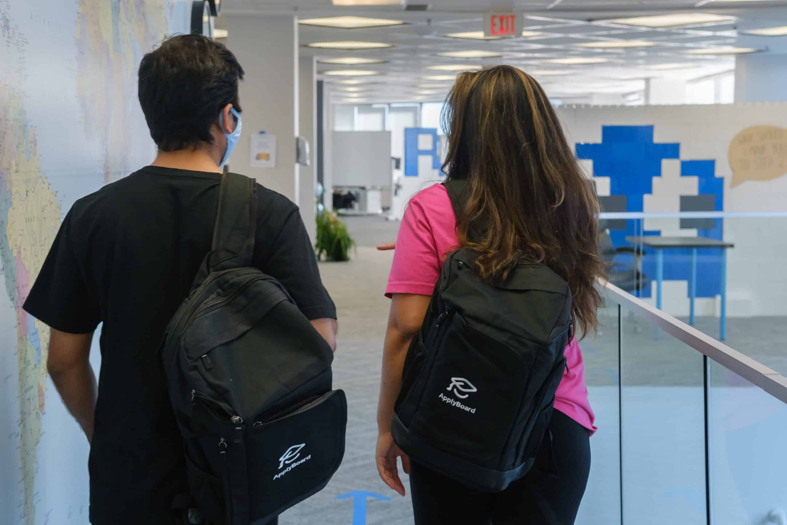 A photo of ApplyBoard staff walking.