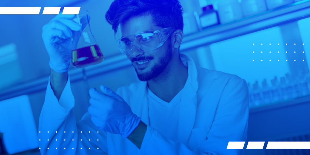 A photo of a student holding a science beaker.