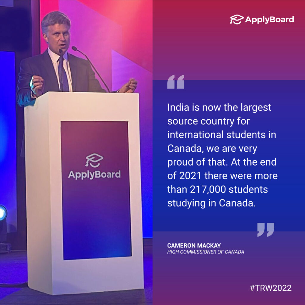 A photo of Cameron MacKay speaking on stage at TRW 2022, next to a quote from his keynote speech: "India is now the largest source country for international students in Canada, we are very proud of that. At the end of 2021 there were more than 217,000 students studying in Canada."